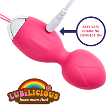 Load image into Gallery viewer, up close photo of large rechargeable vibrating kegel ball plugged in to USB charger with a remote control by Lubilicious - have more fun!
